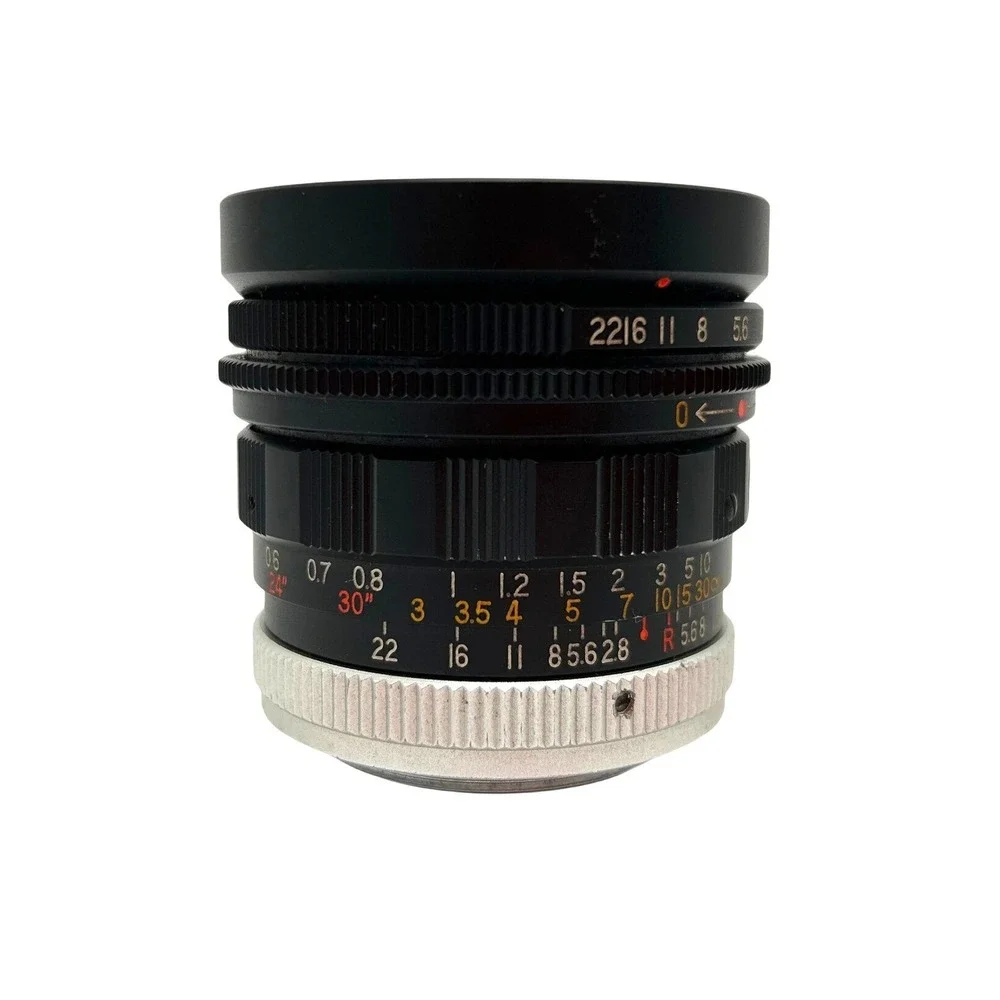 Soligor 28mm f2.8 Wide Angle Lens Japan H69902 with Braun Cap and Case